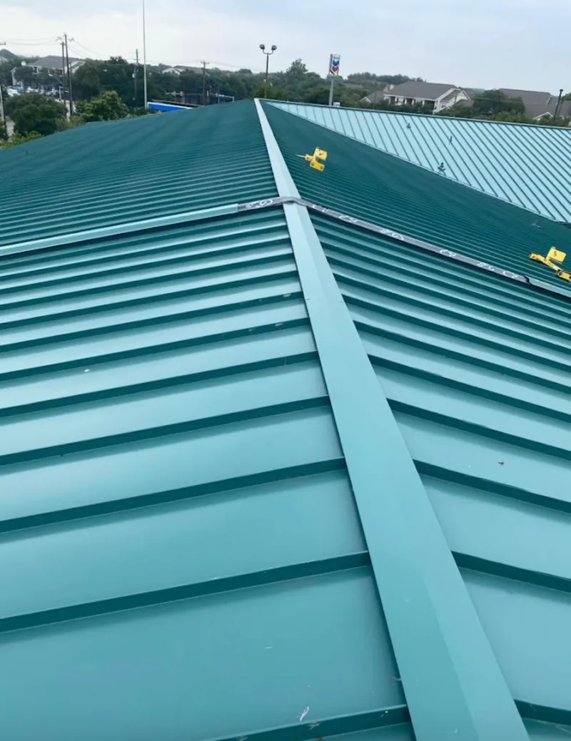 Green commercial metal roof ridge and valley for Metal Roof Repair in Long Beach